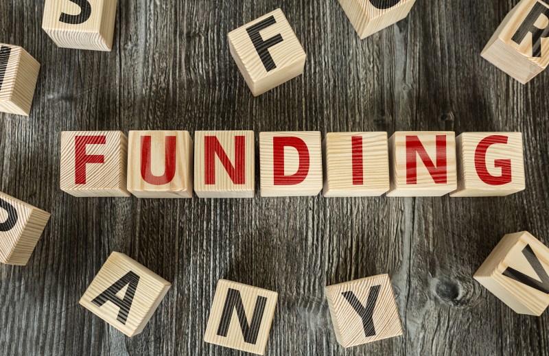Wooden Blocks with the text: Funding